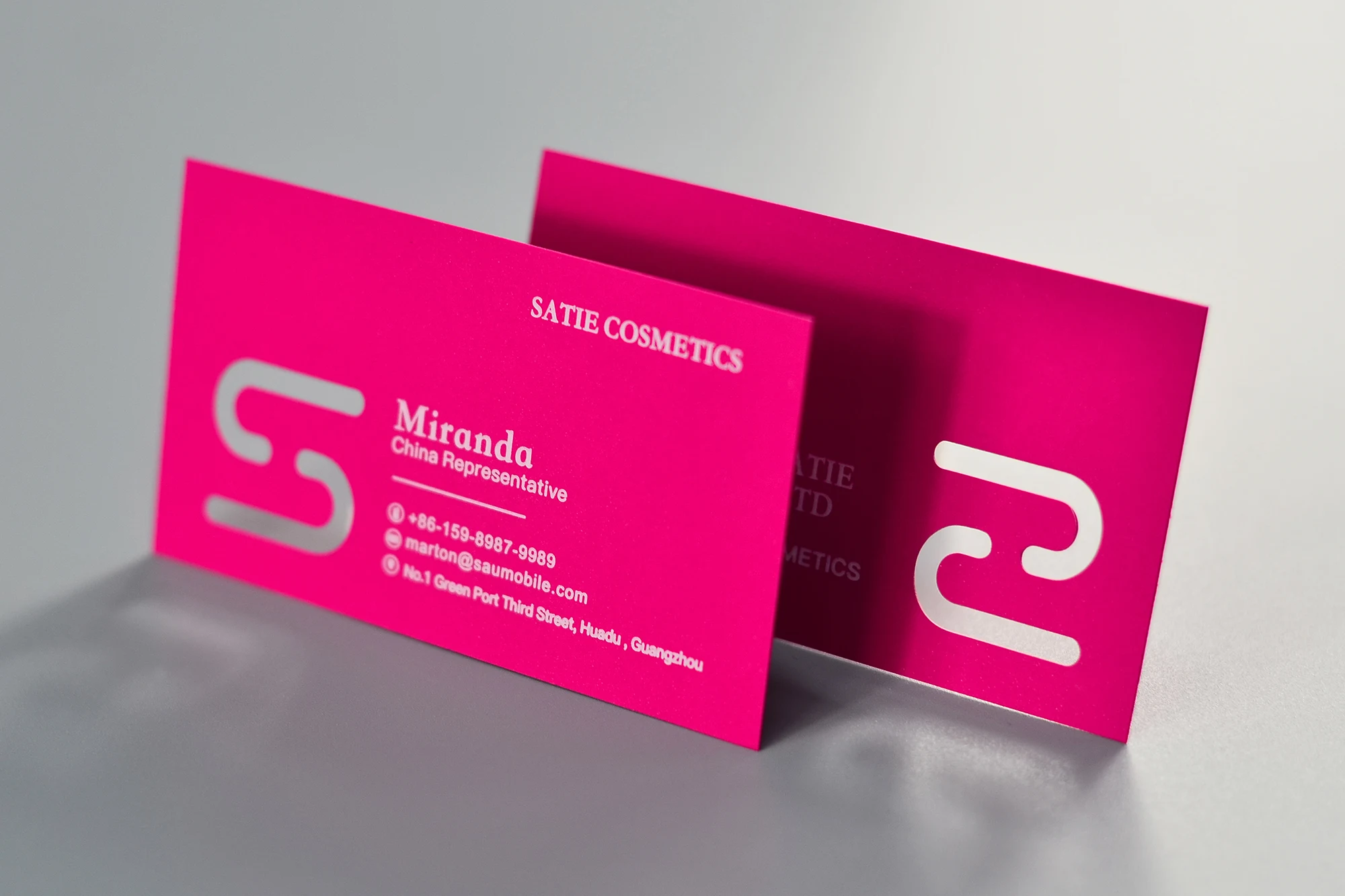 14PT Premium Soft-Touch Pink stock showcasing intricate internal laser cut-outs, demonstrating high-precision structural detail.