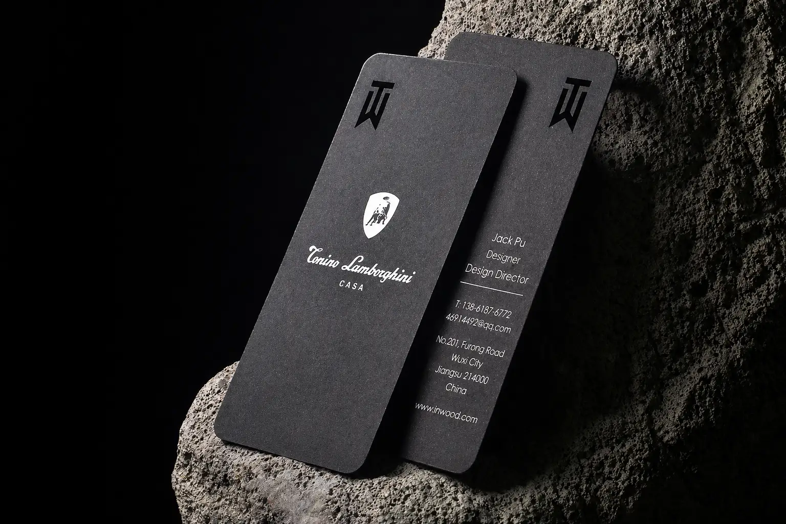 Black business card samples with laser cut and engraved brand details
