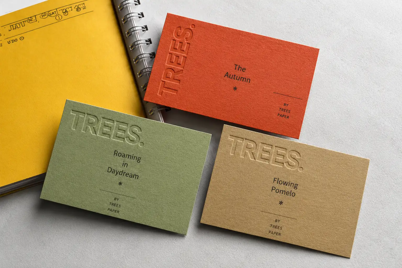 Natural colored eco paper cards with embossing and debossing details