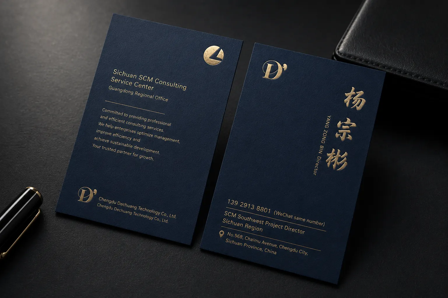Navy business cards with gold foil details and a refined classic brand layout.