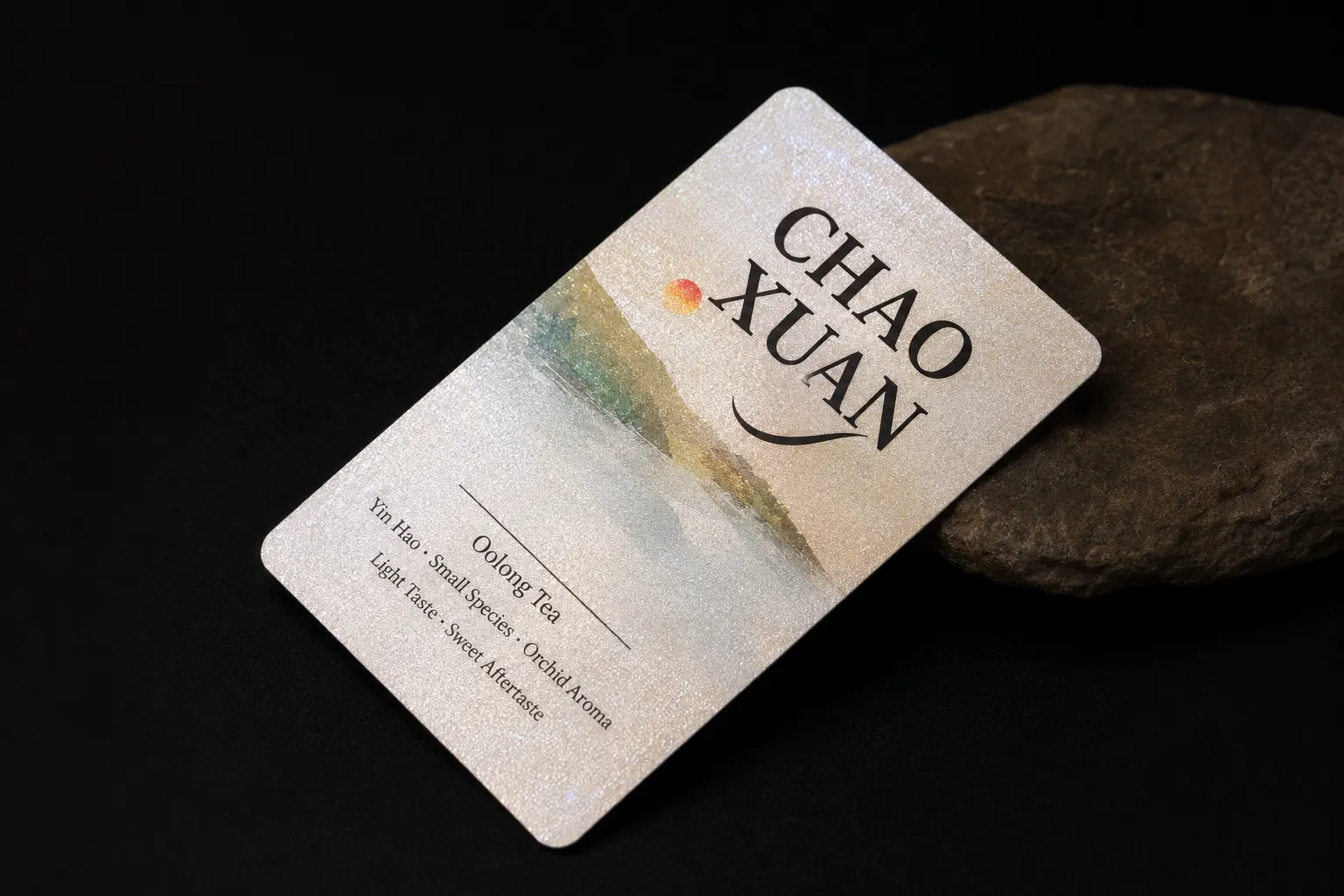 Rounded corner pearlescent business card with soft color artwork
