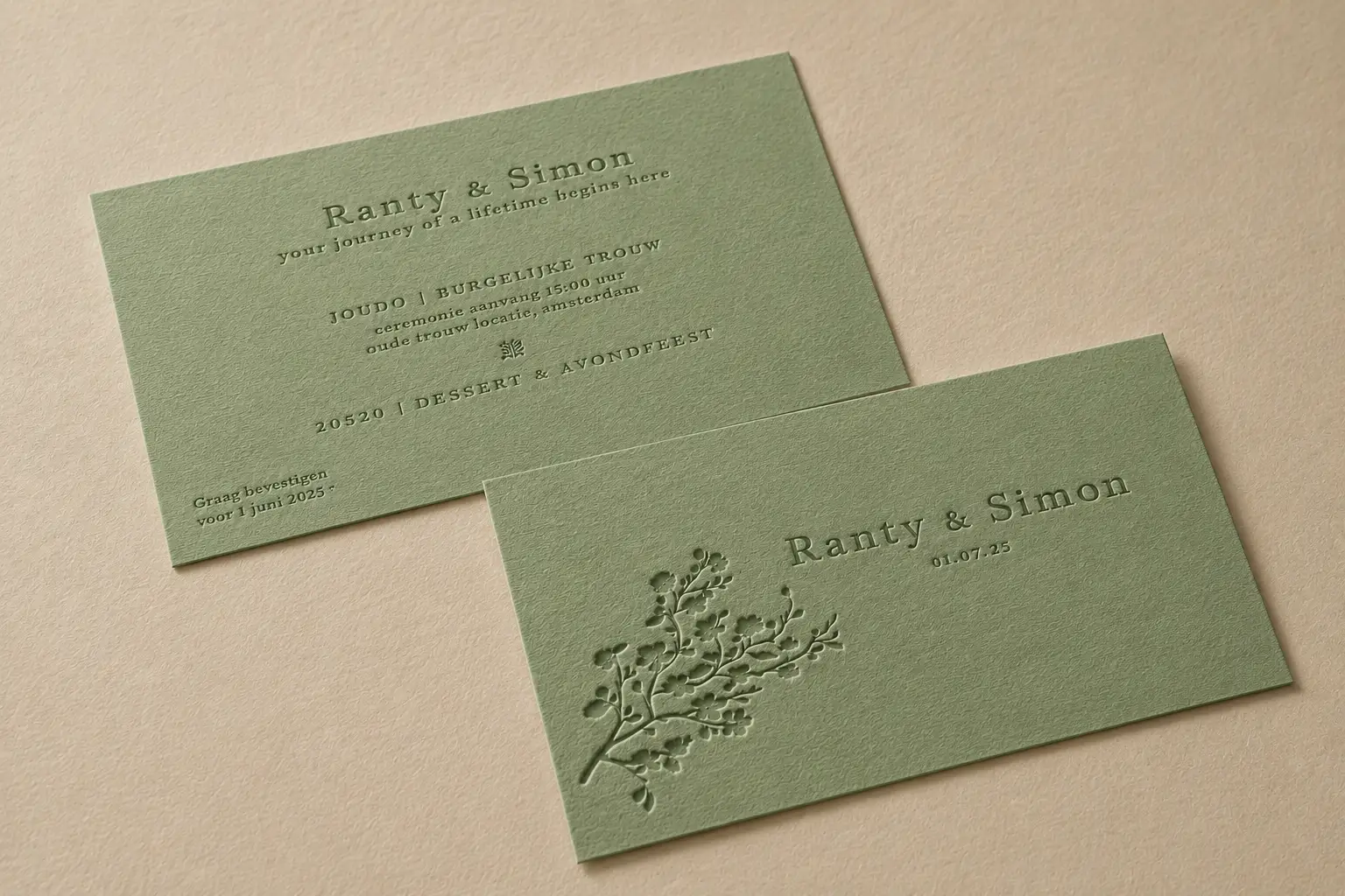 Sage green business cards with subtle blind deboss floral artwork and refined lifestyle brand typography.