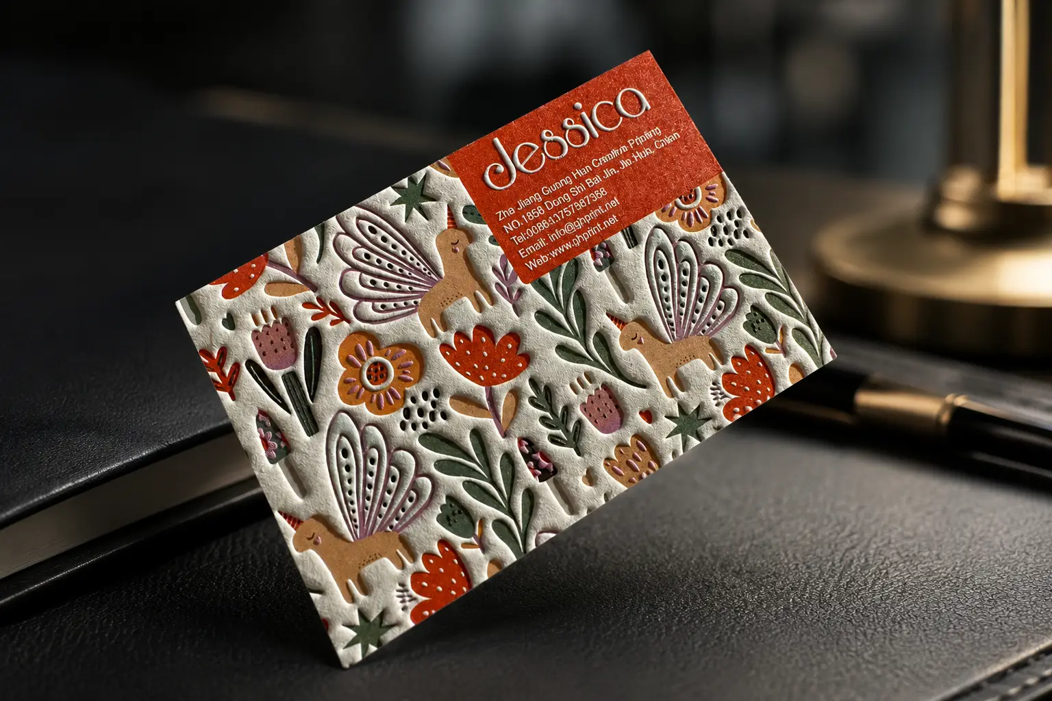 Premium business card with multi-level floral sculpted emboss pattern
