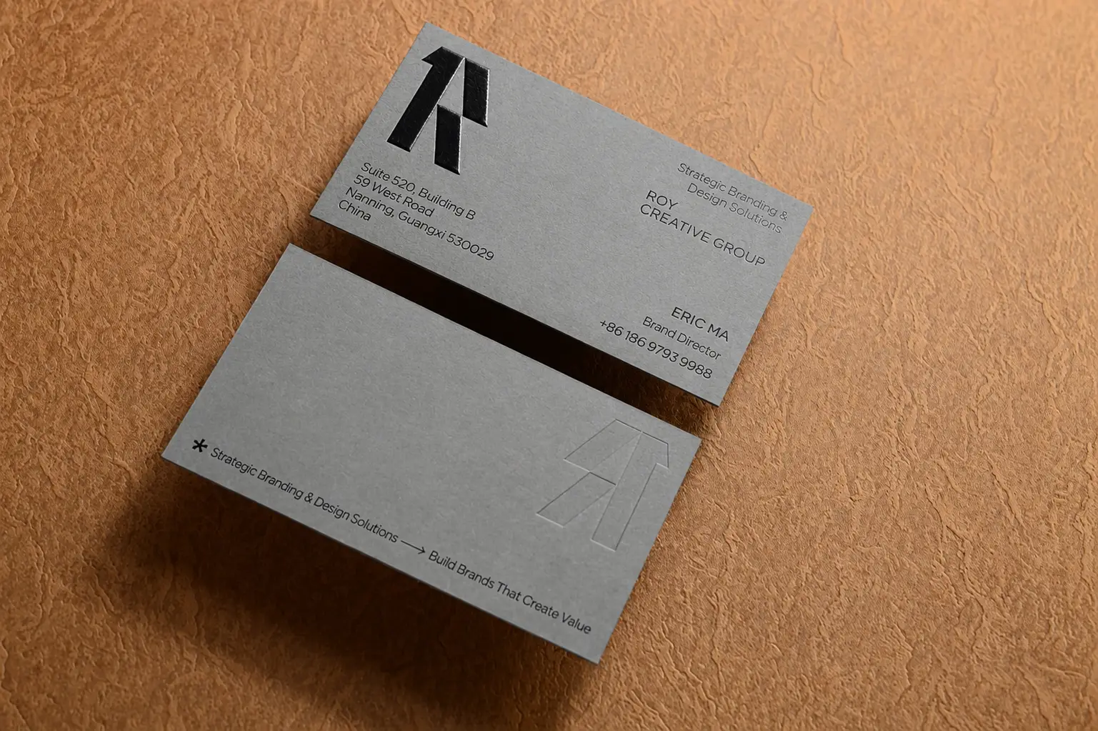 Soft grey eco paper business card with gold foil accent