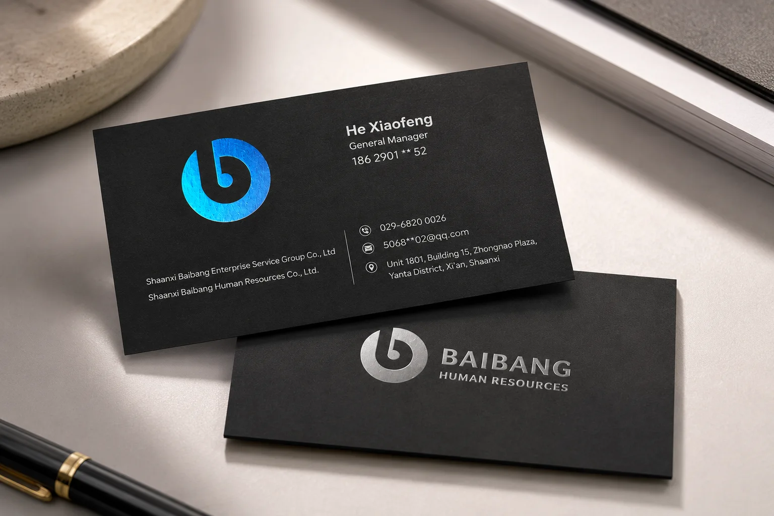 Custom soft touch business cards with a dark matte surface