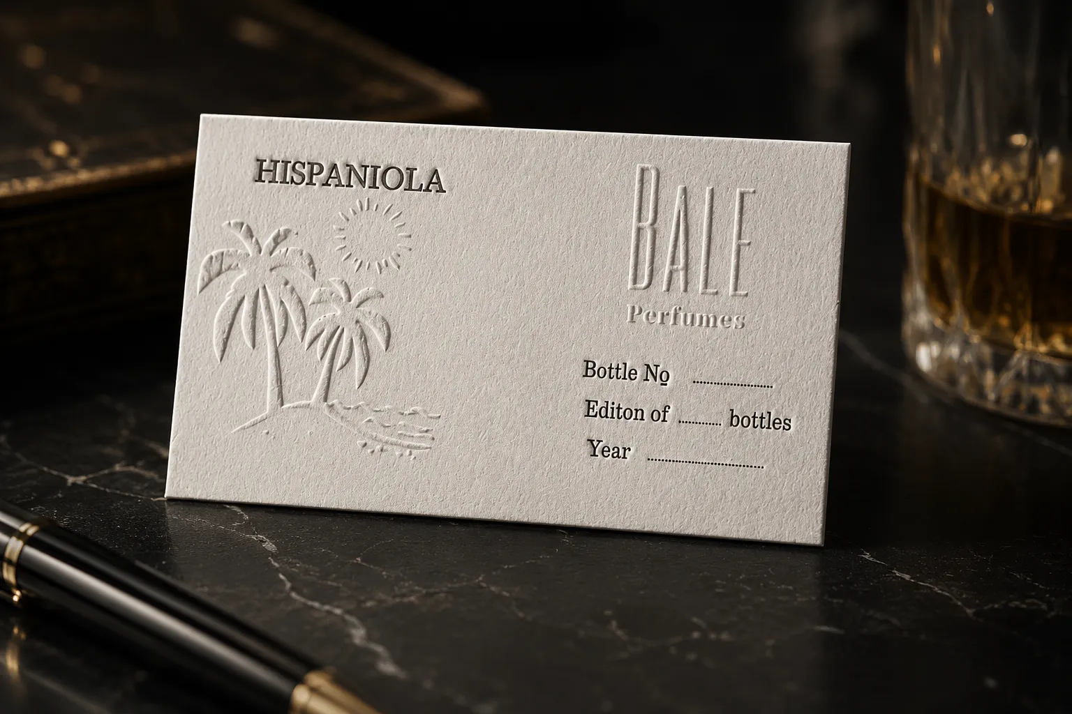 White business card with subtle embossed palm artwork and refined travel brand typography.